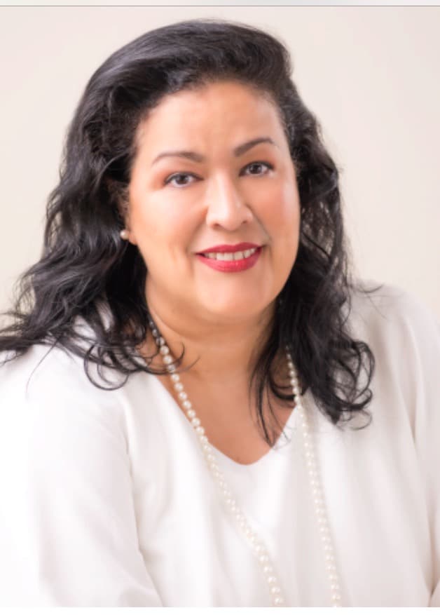 Angela “Tia Angie” Villescaz