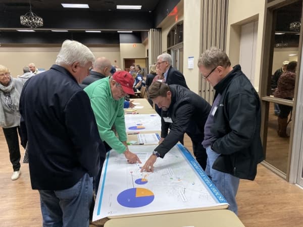 Attendees at the Oct. 29 Lakeway open house learn more about potential transportation projects throughout the city. (Brian Rash/Community Impact Newspaper)