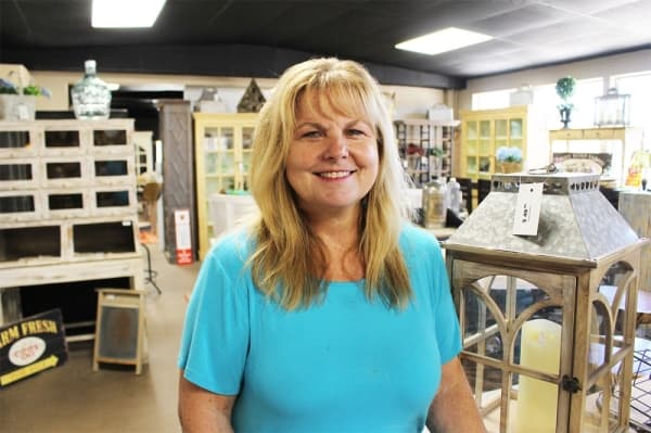 Owner Debbe Pugh offers hand-picked home decor and furniture at her store in Pinehurst. 