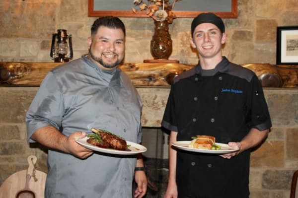 Chef Jesse Cavasos (left) and Joshua Stephens (right) create the dishes on Cedar Lodge's menu.