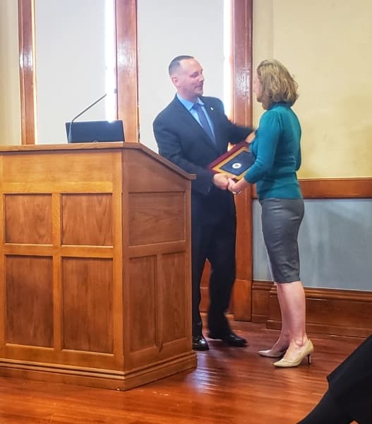 Sherry Golden, right, was named Outstanding Service Officer of the Year Award for 2018-2019 by the Veterans County Service Officers Association of Texas. (Ali Linan/Community Impact Newspaper)