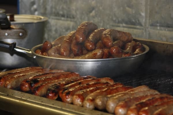 Wurstfest attendees consume sausage each year. (Ian Pribanic/Community Impact Newspaper)