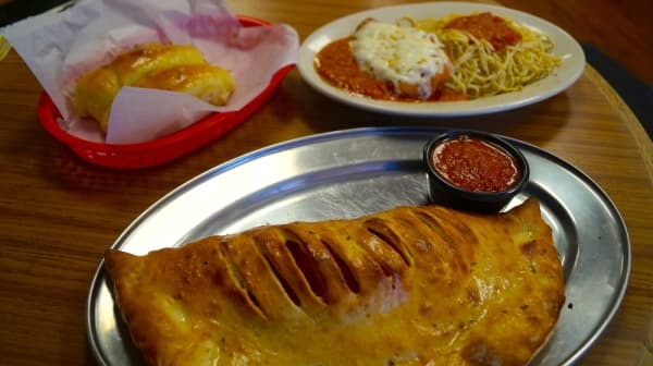 Two of the restuarant's most popular dishes, Karimani said, are the chicken parmigiana and calzones. (Kelsey Thompson/Community Impact Newspaper)