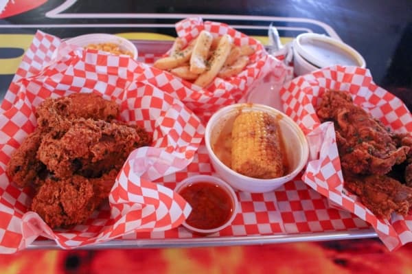 A mixed platter can include fried ribs, wings, corn, french fries, macaroni and cheese and homemade hot sauce.
Photos by Andrew Christman/Community Impact Newspaper
