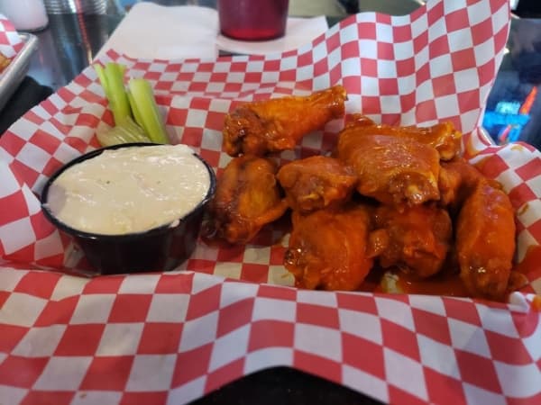 Hot Wings ($9) Choice of bone-in or boneless wings drenched in mild, hot or BBQ sauce.
(Stephen Hunt/Community Impact Newspaper)