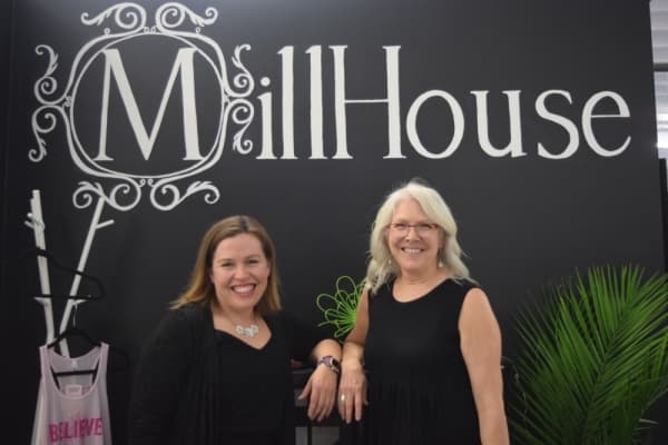 MillHouse co-founders Beth and Carol Beck celebrated the opening of the new space at an event Oct. 14.  (Emily Davis/Community Impact Newspaper)