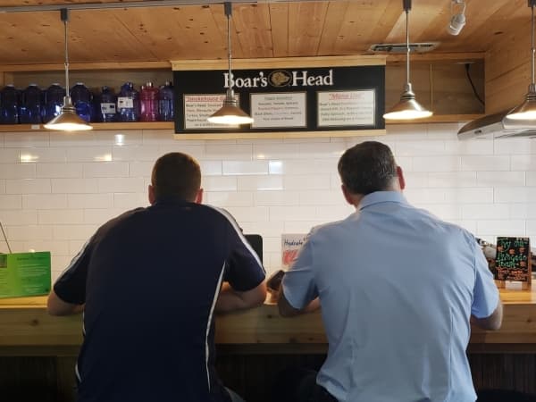 Customers enjoy lunch at Hydrate. (Ali Linan/Community Impact Newspaper)