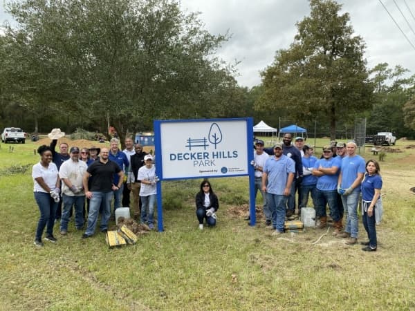 SouthWest Water Company employees add trail, benches to Decker Hills Park in Magnolia
