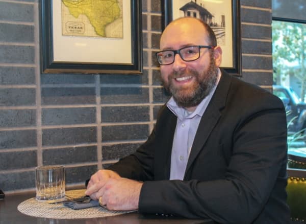 Aaron Hyman became general manager of SwitcHouse Plates & Pours in July. (Adriana Rezal/Community Impact Newspaper) 