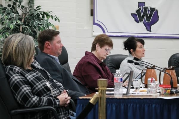 The Willis ISD board of trustees heard public comments for more than 30 minutes. (Andy Li/Community Impact Newspaper)