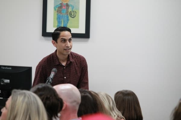 Jason Rocha, the president and CEO of The Woodlands Pride, spoke at the meeting and said 40% of LGBT teenagers attempt suicide because "they didn't feel loved." (Andy Li/Community Impact Newspaper)
