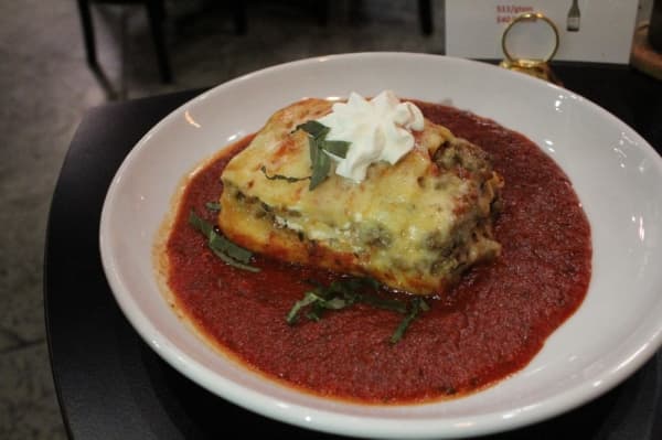 Home-style Italian lasagna ($10.50) is one of the restaurant’s top-sellers. (Photo by Anna Herod/Community Impact Newspaper) 


