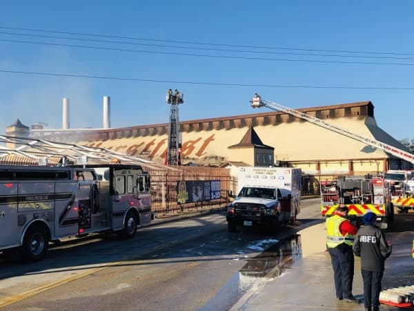 Crews from a Joint Incident Command response team battle a fire on the grounds of Wurstfest on Nov. 15. (Ian Pribanic/Community Impact Newspaper)