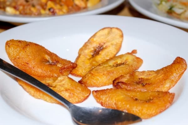 Fried plantains: Plantains resemble bananas but have a firmer flesh, are full of starch and rarely eaten raw. Served as a side ($3). (Nola Z. Valente/Community Impact Newspaper)