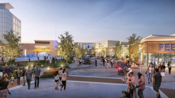 Dine-in movie theater and entertainment venue signs with Mustang Square development in Plano