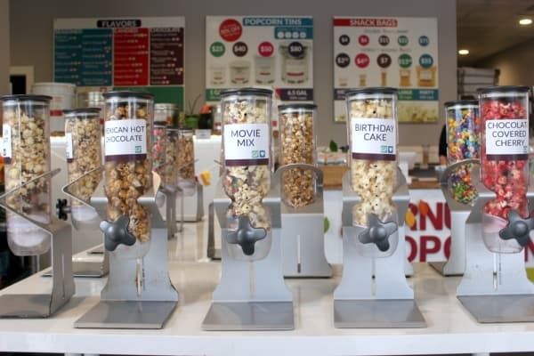 The Northwest Austin location of Cornucopia Popcorn has a tasting room filled with dispensers to allow customers to try any flavor before buying. (Amy Denney/Community Impact Newspaper)