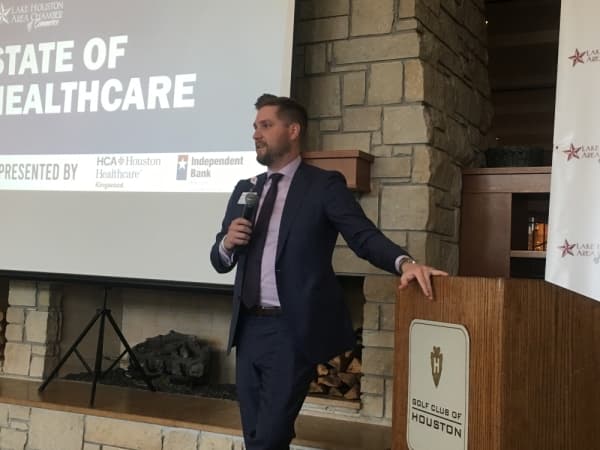 John Corbeil, CEO of HCA Houston Healthcare Kingwood, spoke about providing quality and accessible care at the State of Healthcare luncheon Nov. 19. (Kelly Schafler/Community Impact Newspaper)