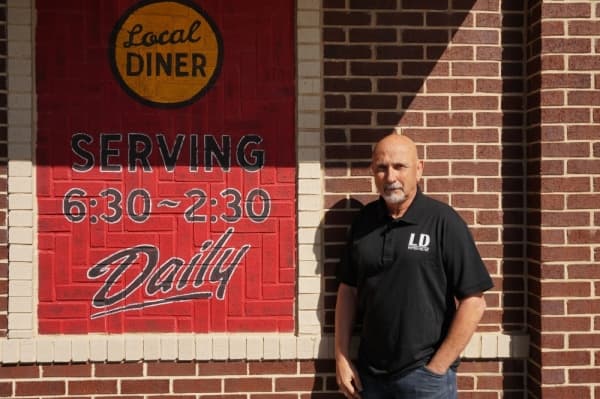 Restaurant owner Frank Brightwell has operated Local Diner since 1989, and now has locations in Coppell and Irving. (Gavin Pugh/Community Impact Newspaper)