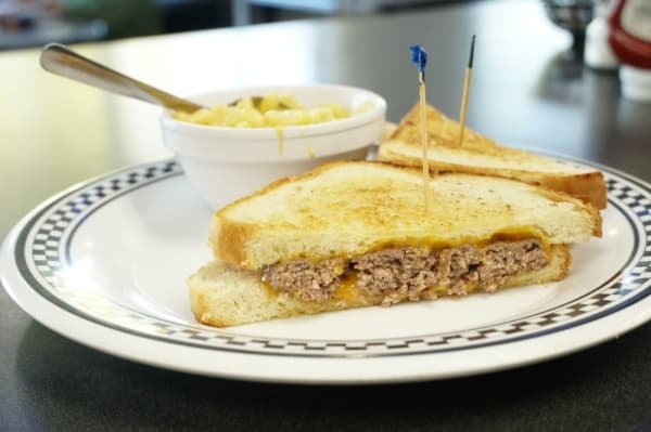 The patty melt ($9.29) comes served with the customer's choice of side, such as macaroni and cheese, soup, french fries and more. (Gavin Pugh/Community Impact Newspaper)