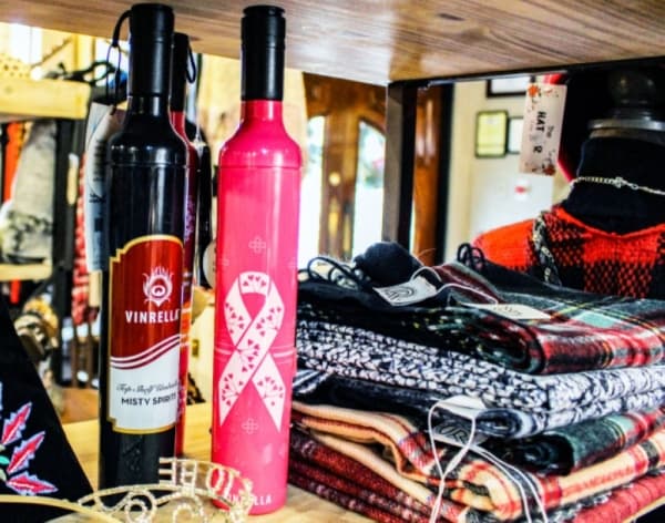 Vinrellas ($25) help keep users prepared for the Houston region’s ever-changing weather. The umbrella is concealed in a waterproof casing designed to look like a wine bottle. (Kelly Schafler/Community Impact Newspaper)