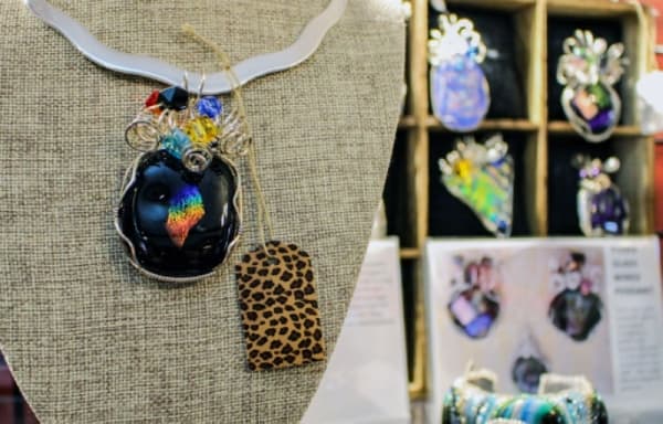 Kingwood jeweler Suzanya creates handmade glass pendants and bracelets ($75-$300). (Kelly Schafler/Community Impact Newspaper)
