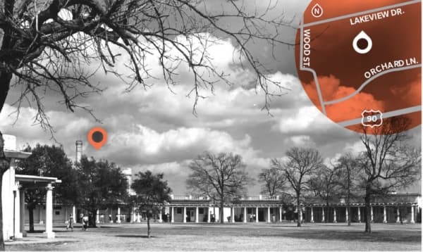 In this photo from the 1940s, the gym can be seen on the left-hand side behind two trees, which still stand today.
