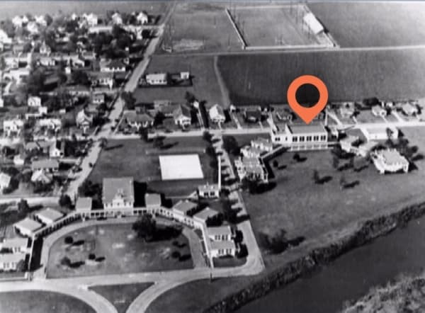 This aerial photo of the Lakeview campus was taken prior to 1936. The gym is the apex building of the right-hand semi-circle.