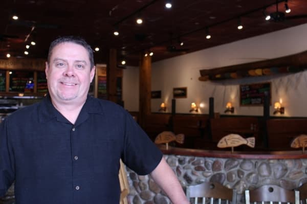 Mark Maddock has worked at Rockfish for 17 years, starting as a general manager and financial partner before becoming vice president of operations. (Renee Yan/Community Impact Newspaper)