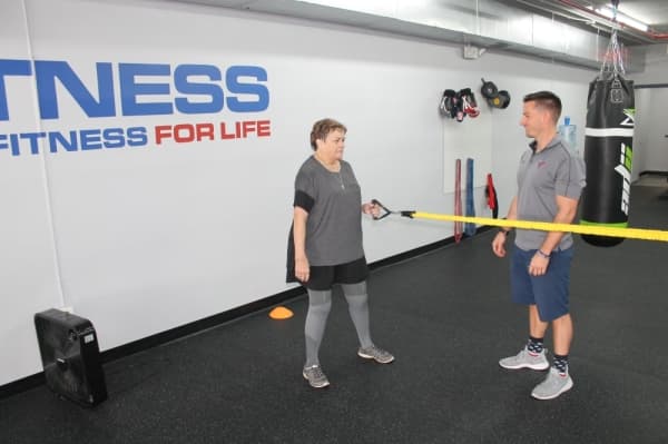 J.P. Prichard said she is more active and healthy since training at TriFitness Gym. (Jake Magee/Community Impact Newspaper)