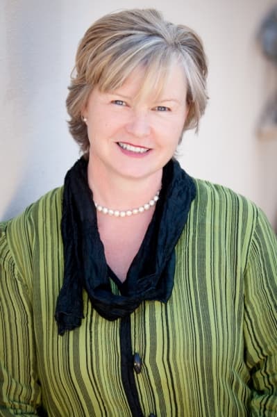 A photo of Tamzin Chochrane, a woman in a green jacket.