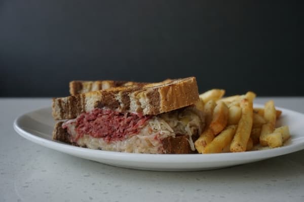 The reuben sandwich ($9.59) comes with homemade corned beef, sauerkraut and Swiss cheese on grilled rye. (Gavin Pugh/Community Impact Newspaper)