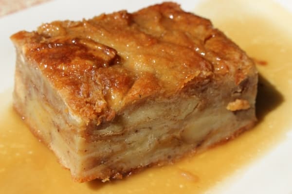 One of the most popular desserts in the homemade bread pudding, which is served with a bourbon butter sauce. Maddock compared it to a dense cake. (Renee Yan/Community Impact Newspaper)
