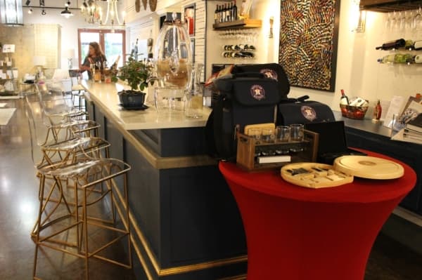 Visitors to Luxe can stop by the bar in the center of the store. (Photo by Andrew Christman/Community Impact Newspaper)
