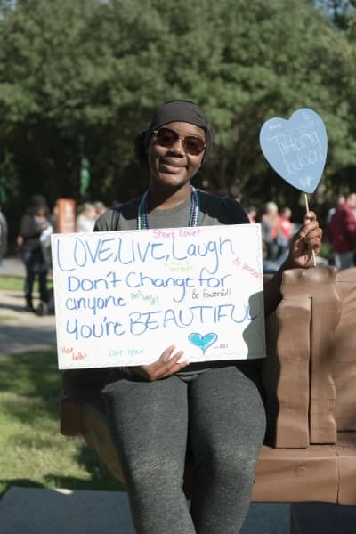 5. Supporters gathered at Town Green Park with messages of hope for survivors and individuals enduring suicide loss.
Courtesy Meredith Paulcheck Photography