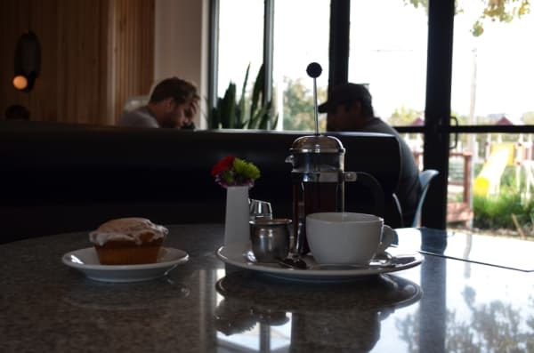 The cafe offers organic coffee served in an individual french press. 
