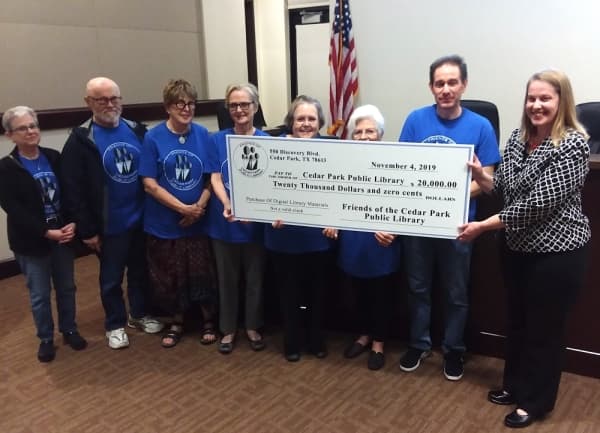 Nonprofit group presents $20,000 to Cedar Park Public Library