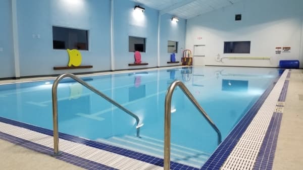 A photo of an indoor swimming pool.