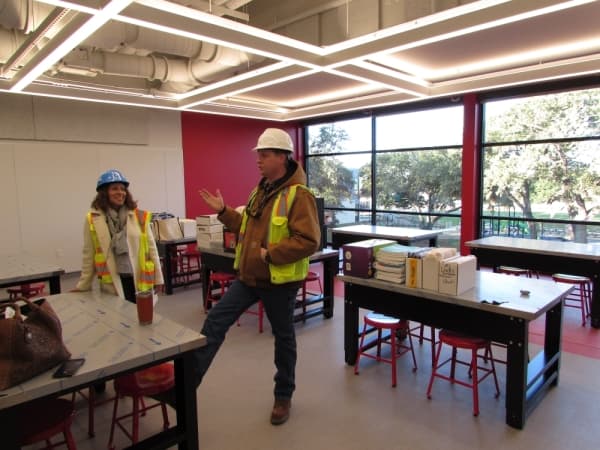 Loyola and Johnson stand in the schol's Maker Space. (Nicholas Cicale/Community Impact Newspaper)