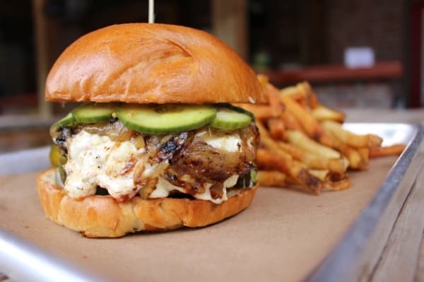 Fire Ant Brewpub serves craft beer and upscale bar food, including the pimento cheese burger. (Kara McIntyre/Community Impact Newspaper)