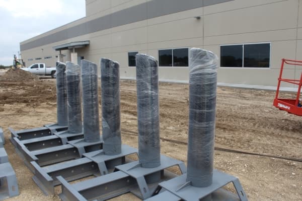 The depository will have bollards, or vertical posts that serve as anti-vehicle barriers. (Marisa Charpentier/Community Impact Newspaper)