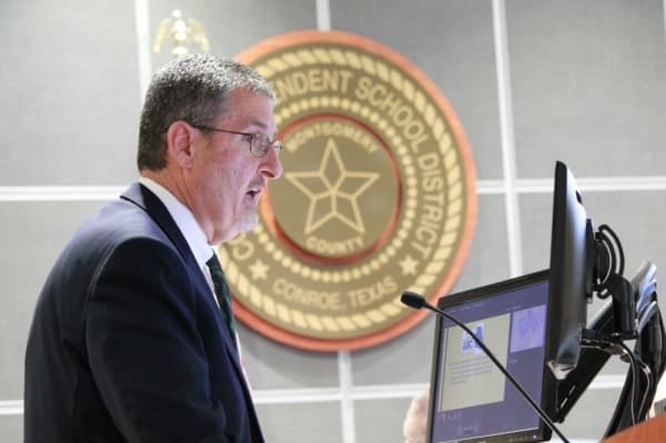 Deputy Superintendent Chris Hines presented potential rezoning options for Conroe ISD. (Andy Li/Community Impact Newspaper)