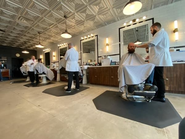 Old-fashioned barbershop offers straight razor shaves and beard trims on Anderson Ln.