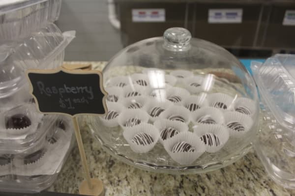 Ecuadorian Chocolate Factory serves raspberry-flavored bon bons. (Marisa Charpentier/Community Impact Newspaper)