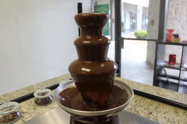 A chocolate fountain is on display. (Marisa Charpentier/Community Impact Newspaper)