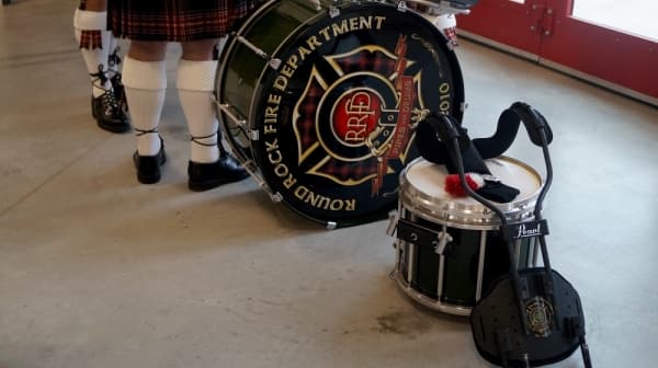 Representatives from Round Rock and Taylor Fire Departments, among other Williamson County departments, were present for the Dec. 20 dedication ceremony. (Kelsey Thompson/Community Impact Newspaper)