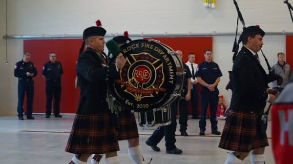 Members of the Round Rock Fire Department Pipes and Drums performed during the Dec. 20 ceremony. (Kelsey Thompson/Community Impact Newspaper)
