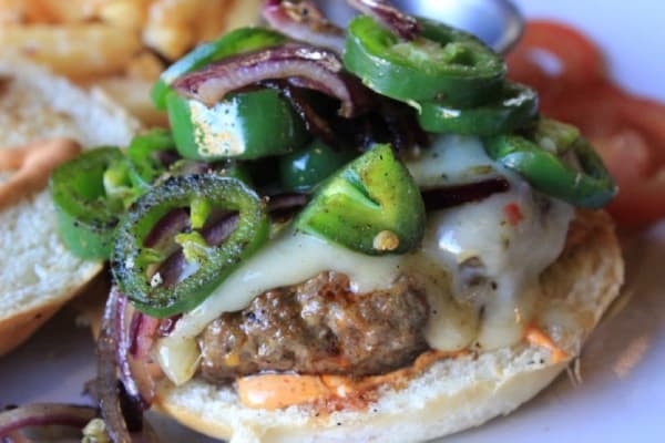 Diablo burger: $10.95. This burger is topped with grilled onions, grilled jalapenos, tomato, pepper jack cheese and chipotle mayonnaise. It is served with habanero sauce on the side. Jack Flagler/Community Impact Newspaper