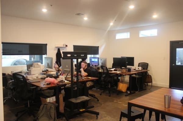Digital designers work at the St. Elmo Accomplice offices. (Olivia Aldridge/Community Impact Newspaper)