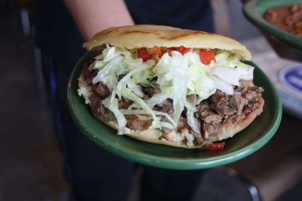 Gorditas ($5): Refried beans, beef fajita, lettuce and tomato are served on homemade flour tortillas. (Danica Smithwick/Community Impact Newspaper)
