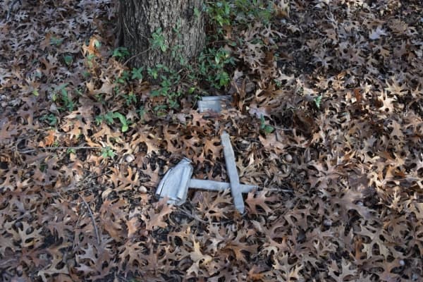 Many gravesite markers have deteriorated to the point of being unrecognizable. (Emily Davis/Community Impact Newspaper)